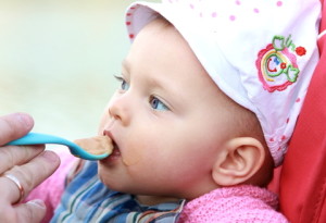 http://www.dreamstime.com/royalty-free-stock-photo-baby-girl-eating-spoon-image24806475
